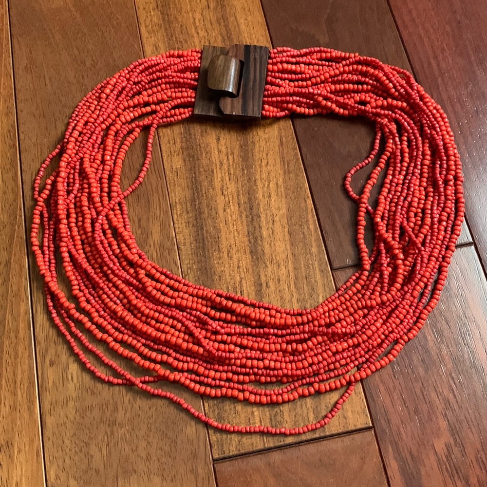 Coral color multiple beaded string necklace